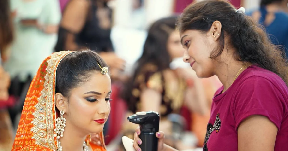 Professional airbrush makeup artist applying flawless foundation at Trytoon Beauty and Wellness Academy Bhubaneswar