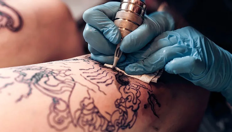 Student practicing creative tattoo designs in classroom at Trytoon Academy Bhubaneswar