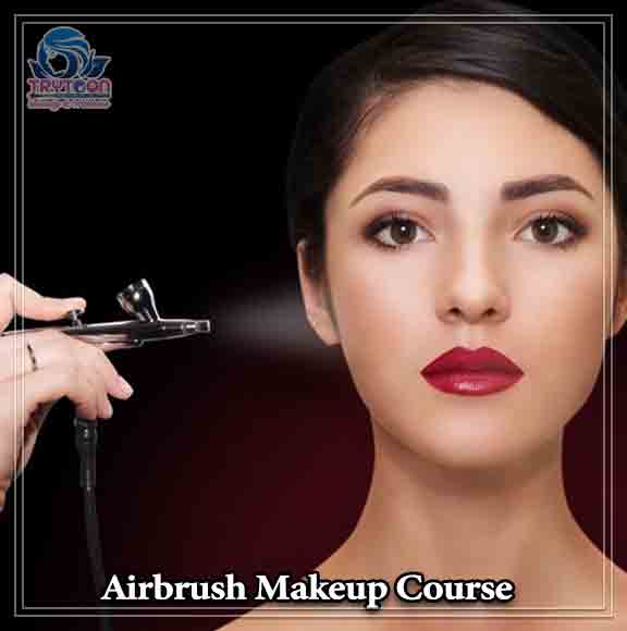 Makeup instructor guiding student on airbrush face painting