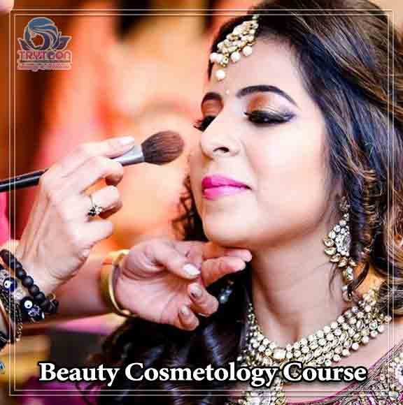 Students learning professional makeup techniques in a modern cosmetology classroom